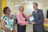 President Vasciannie Presents Collection of his Publications to Calvin McKain Library